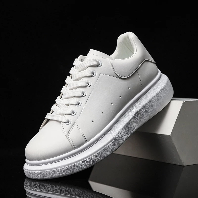 Monde heren sneakers van wit leer met dikke plateausohle