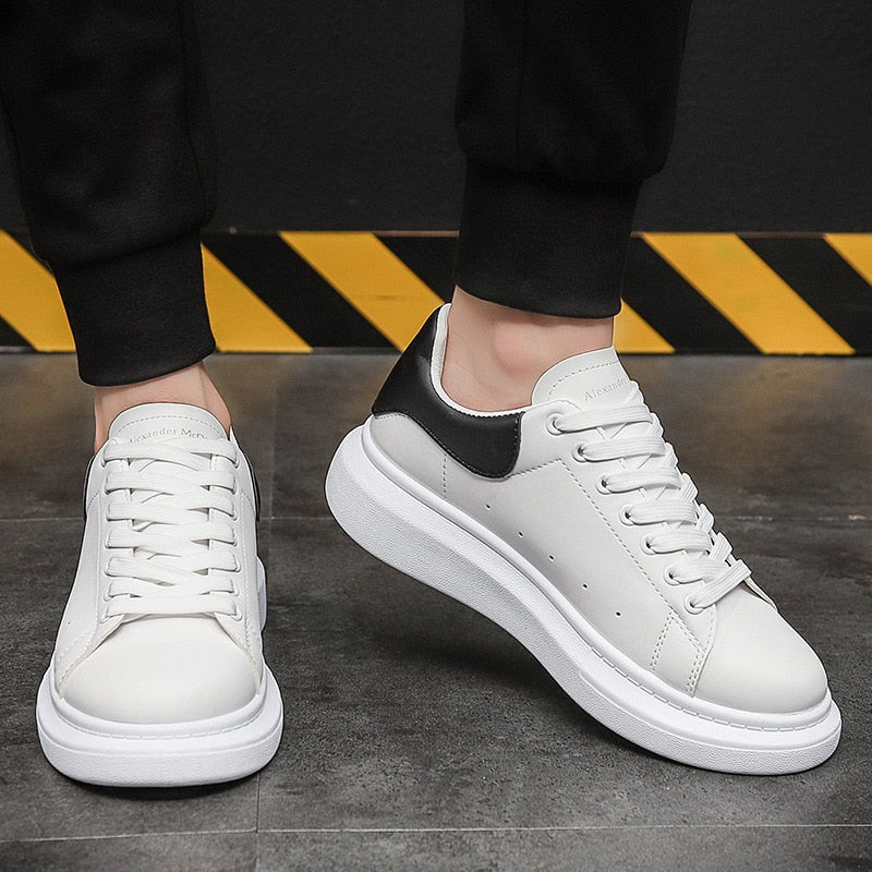Monde heren sneakers van wit leer met dikke plateausohle