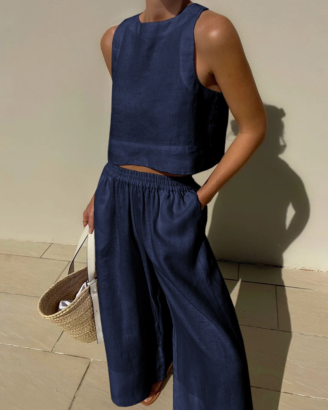 Évoque | Tweedelige dames set met mouwloze crop top en wijde broek
