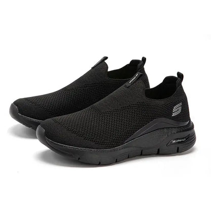 Élanor | Zwarte slip-on sneakers van katoenmix met minimalistisch design