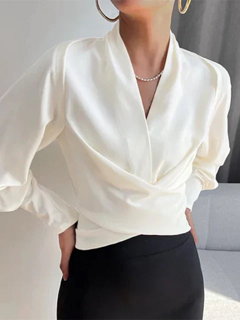 Élanor V-hals damesblouse met pofmouwen – verfijnde pasvorm