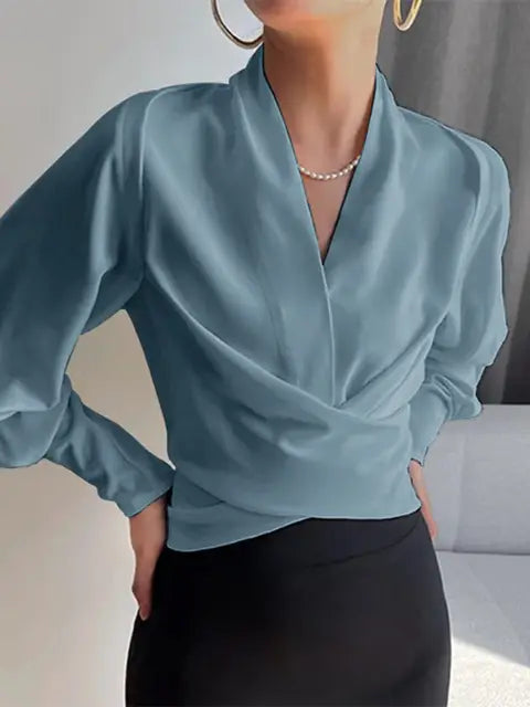 Élanor V-hals damesblouse met pofmouwen – verfijnde pasvorm