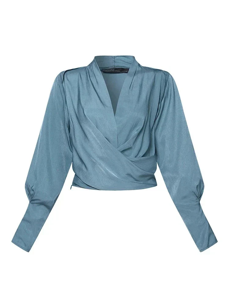 Élanor V-hals damesblouse met pofmouwen – verfijnde pasvorm