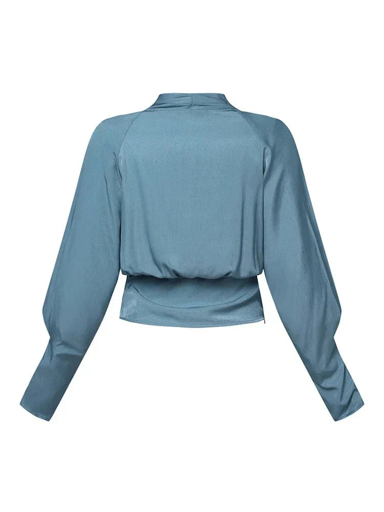 Élanor V-hals damesblouse met pofmouwen – verfijnde pasvorm
