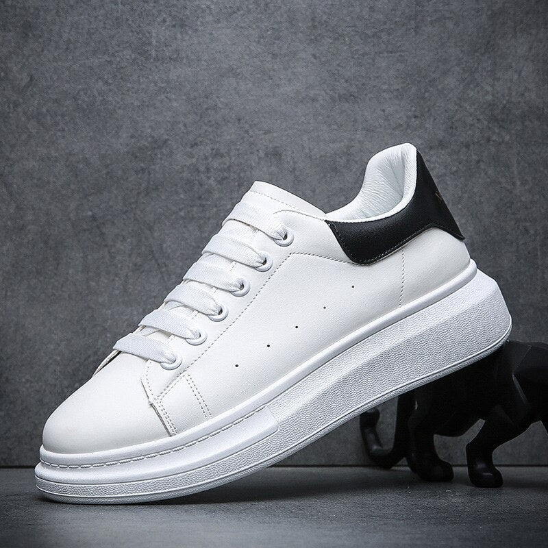 Monde heren sneakers van wit leer met dikke plateausohle